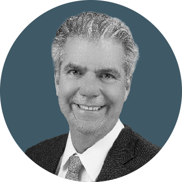 a headshot of david hewett