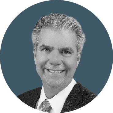 a headshot of david hewitt from merchants bonding