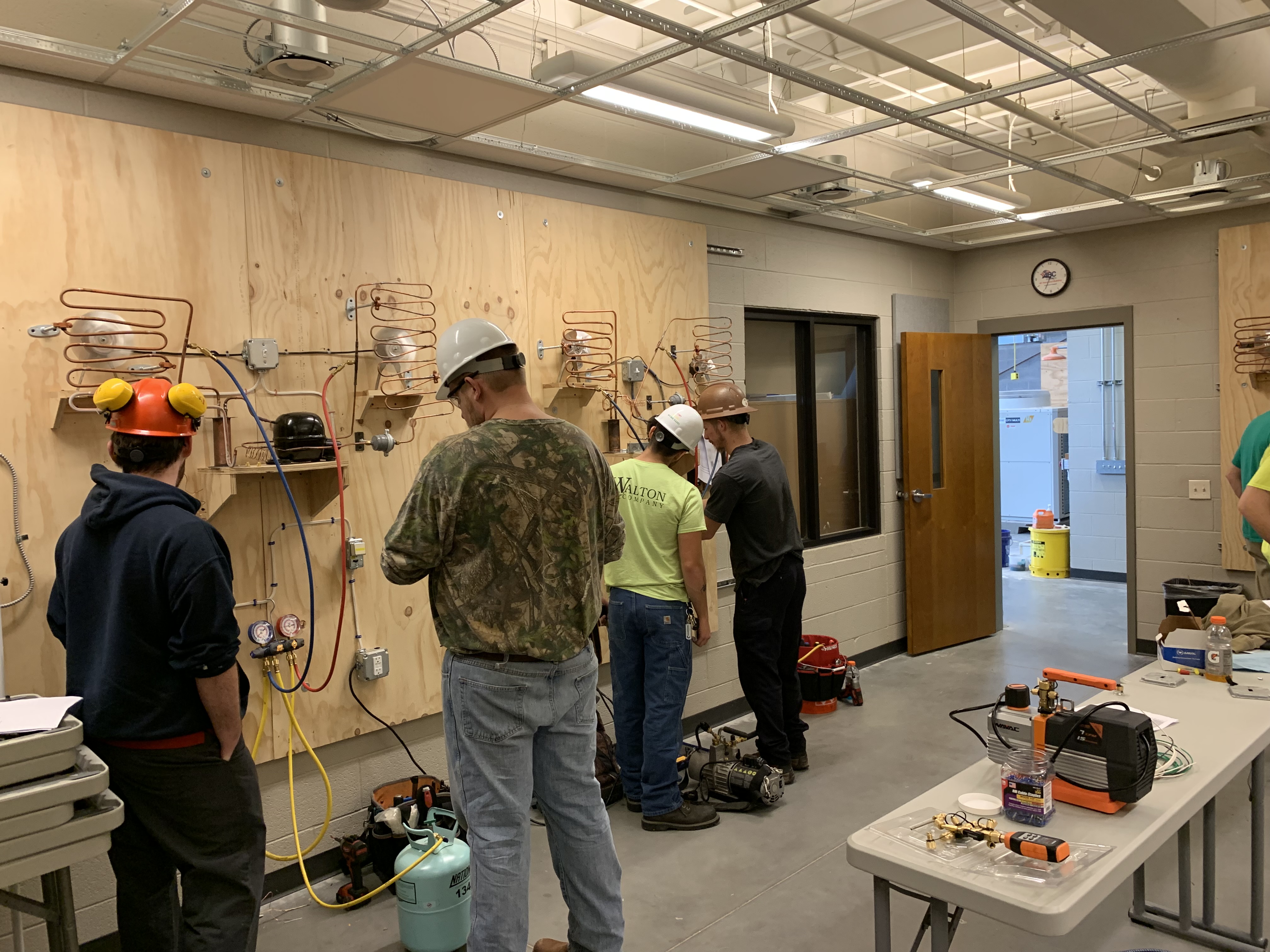 construction apprentices working on a project in a classroom