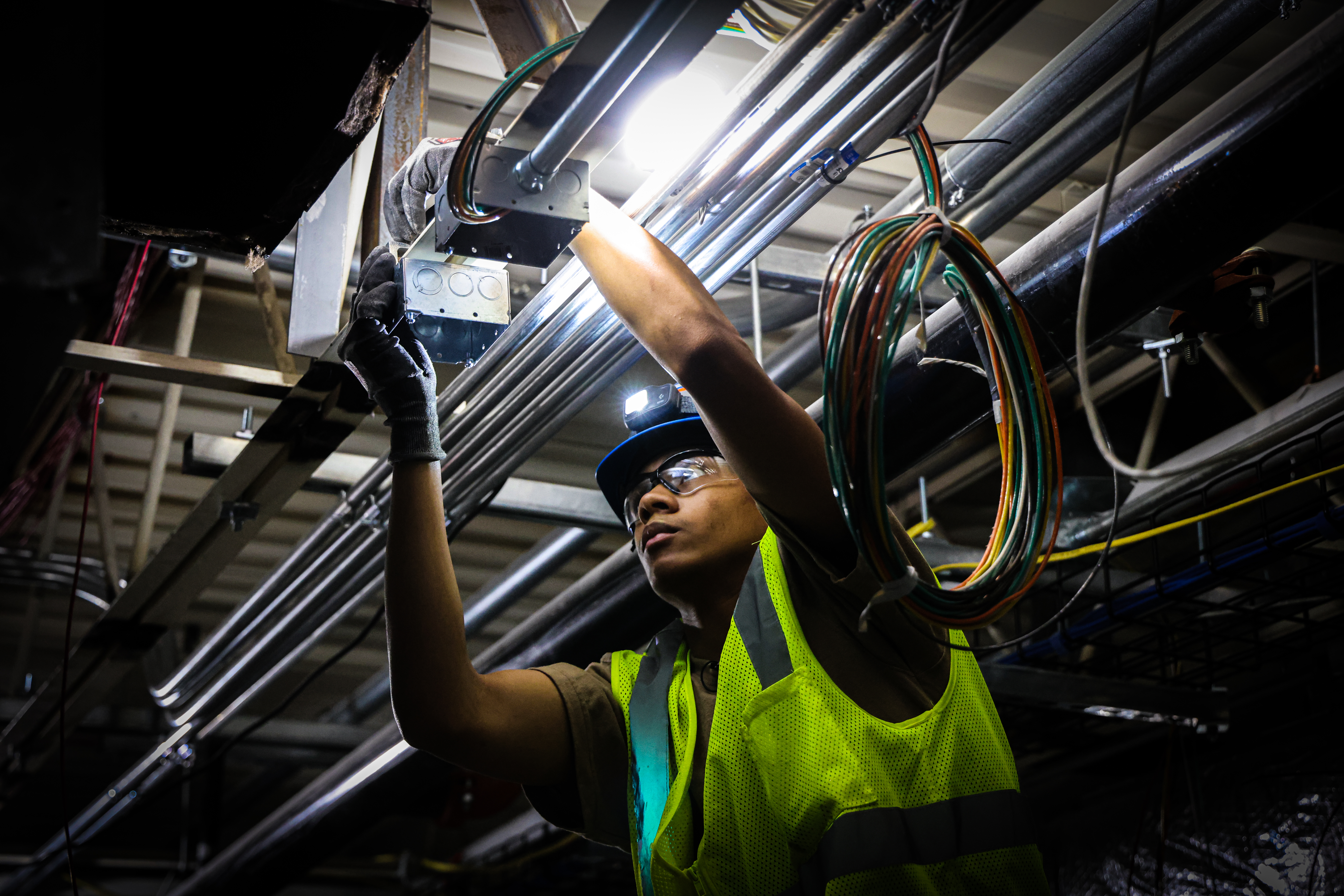 a construction worker doing electrical work