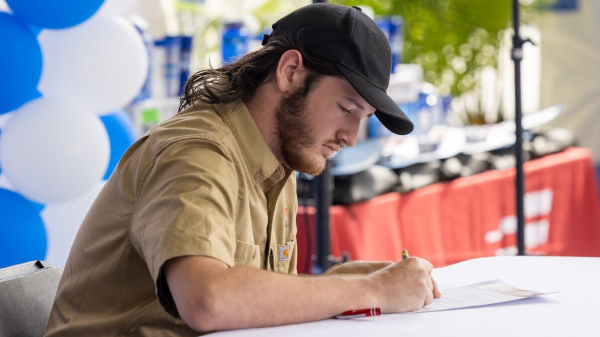 a trades student at National Signing Day 2024 with the Lowe's Foundation